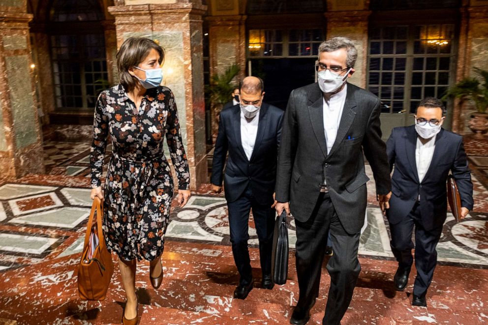 PHOTO: Ministry of Foreign Affairs Chairwoman Theodora Gentzis and Iran Deputy Foreign Miister Ali Bagheri Kani walk together during a diplomatic meeting between the Belgian Foreign Affairs Ministry and a delegate of Iran in Brussels, Oct. 27, 2021.