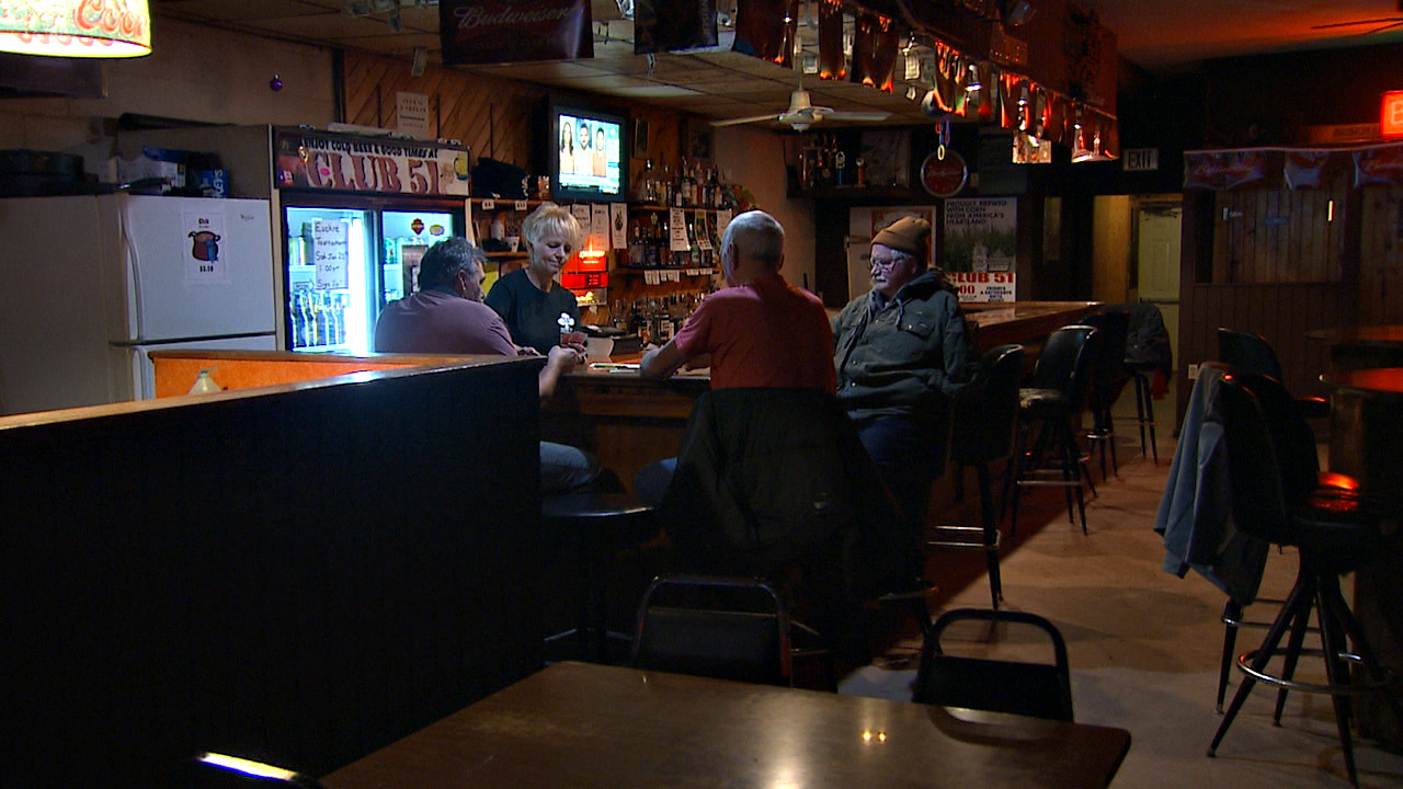 PHOTO: Inside Club 51, the only bar in downtown Postville, Ia., a group of local men play cards and discuss immigration. Im for the wall 100%, said one resident, who asked to remain anonymous, speaking with ABC News.