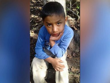 PHOTO: This Dec, 12, 2018 photo provided by Catarina Gomez, shows her half-brother Felipe Gomez Alonzo, 8, near her home in Yalambojoch, Guatemala.