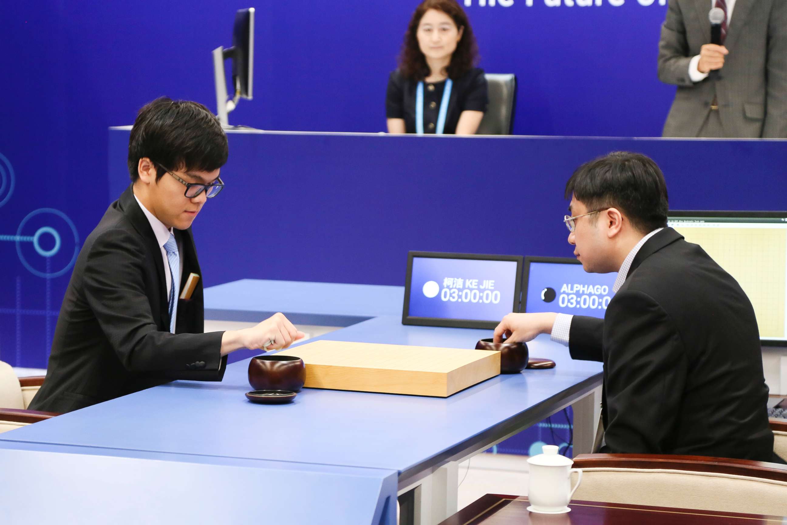 PHOTO: The World's top human player Ke Jie (L) competes against Google's artificial intelligence program AlphaGo during the Future of Go Summit at Wuzhen Town on May 23, 2017, in Jiaxing, Zhejiang Province of China. 
