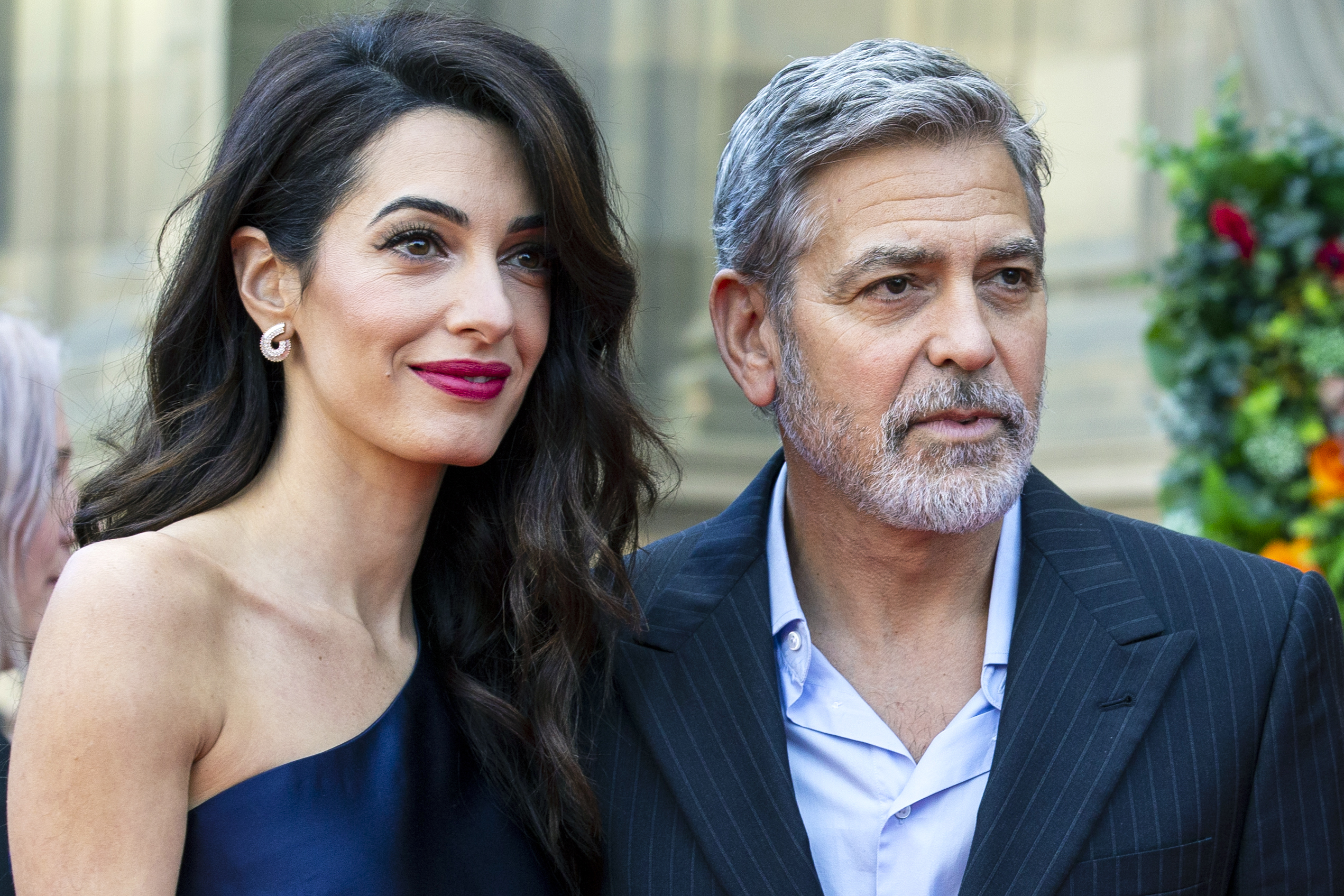 PHOTO: Amal and George Clooney attend the People's Postcode Lottery Charity Gala at McEwan Hall, March 15, 2019, in Edinburgh, Scotland.