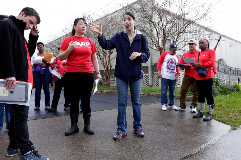 PHOTO: In this Feb. 23, 2019 photo, Houston city council member Amanda K. Edwards, center, gives instructions to staff and volunteers before they head out in groups to canvas houses affected by the floods of Hurricane Harvey in Houston.