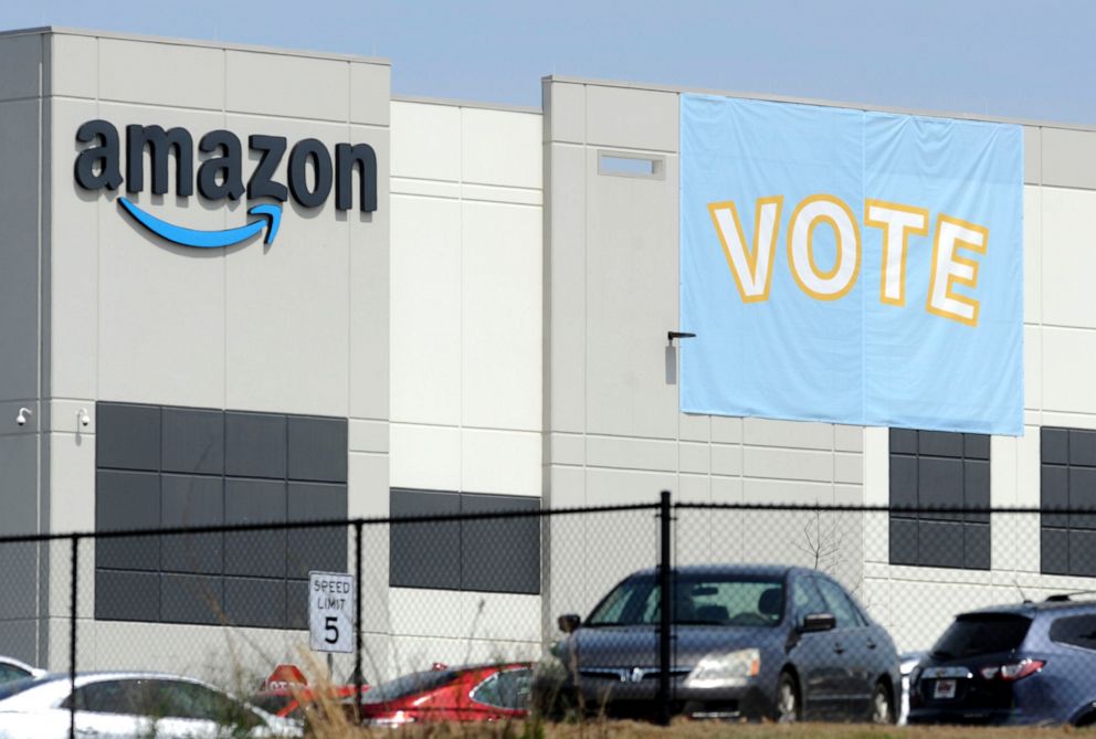 A banner encouraging workers to vote in labor balloting is shown on March 30, 2021 at an Amazon warehouse in Bessemer, Alabama.