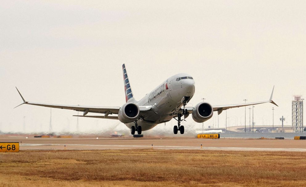 PHOTO: An American Airlines Boeing 737 MAX airplane takes off on a test flight from Dallas-Fort Worth International Airport in Dallas, Texas, Dec. 2, 2020.