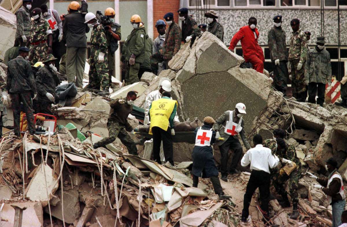 PHOTO: A body is carried from the wreckage in Nairobi, Kenya, following a bombing near the U.S. Embassy, Aug. 9, 1998.