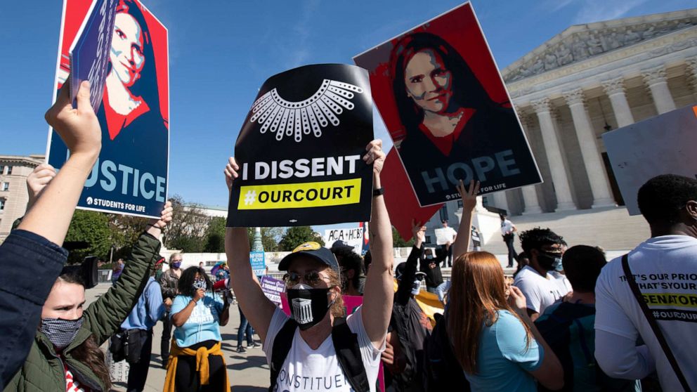 PHOTO: People protest for and against the confirmation of President Donald Trump's Supreme Court nominee Amy Coney Barrett, outside the Supreme Court on Capitol Hill, in Washington, Oct. 14, 2020.