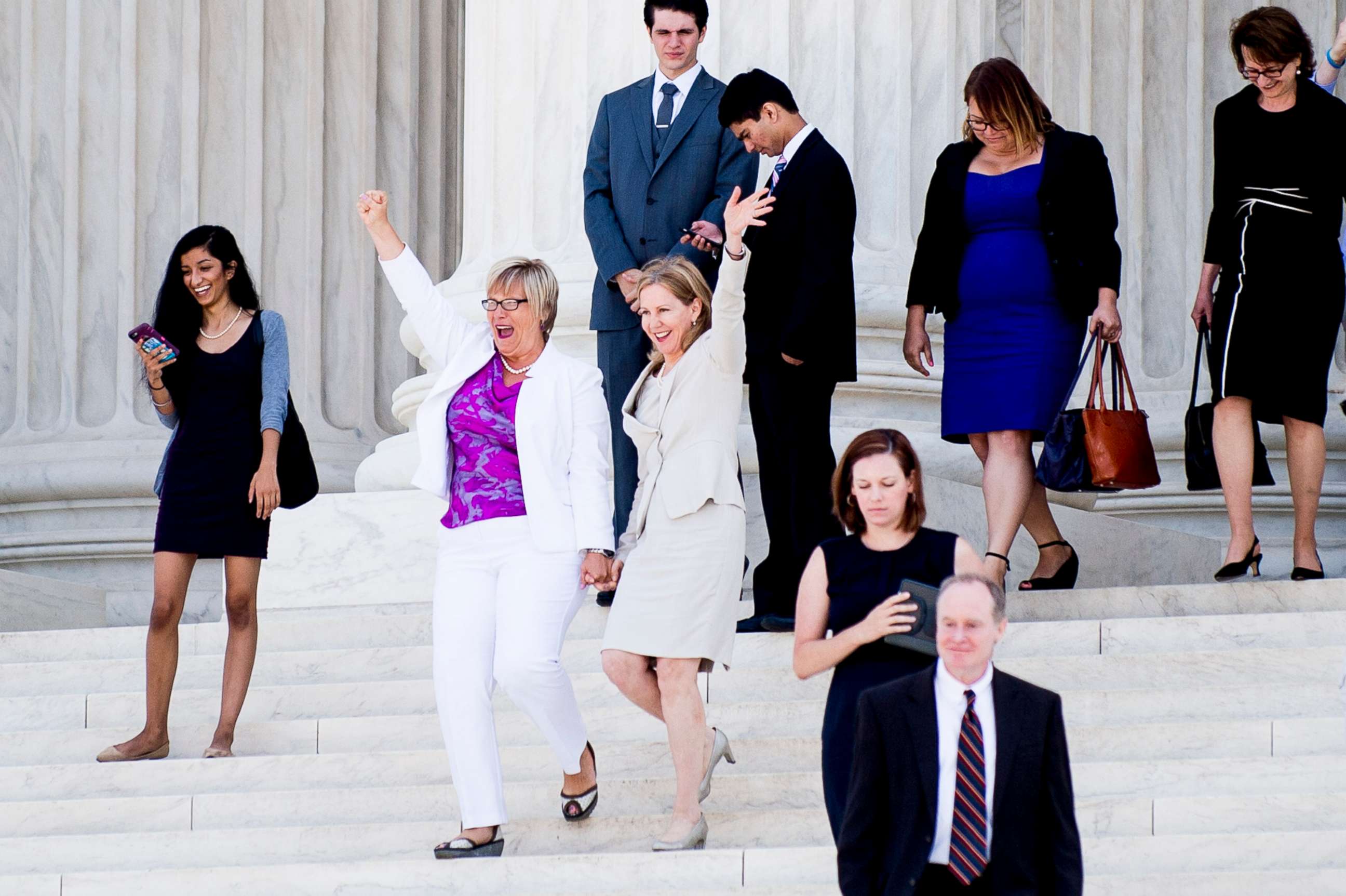 PHOTO: Texas abortion provider Amy Hagstrom-Miller and Nancy Northup, President of The Center for Reproductive Rights wave to supporters as they decend the steps of the United States Supreme Court on June 27, 2016, in Washington.