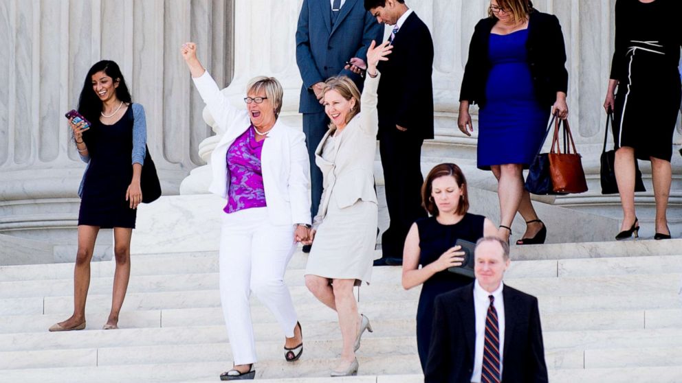 PHOTO: Texas abortion provider Amy Hagstrom-Miller and Nancy Northup, President of The Center for Reproductive Rights wave to supporters as they decend the steps of the United States Supreme Court on June 27, 2016, in Washington.