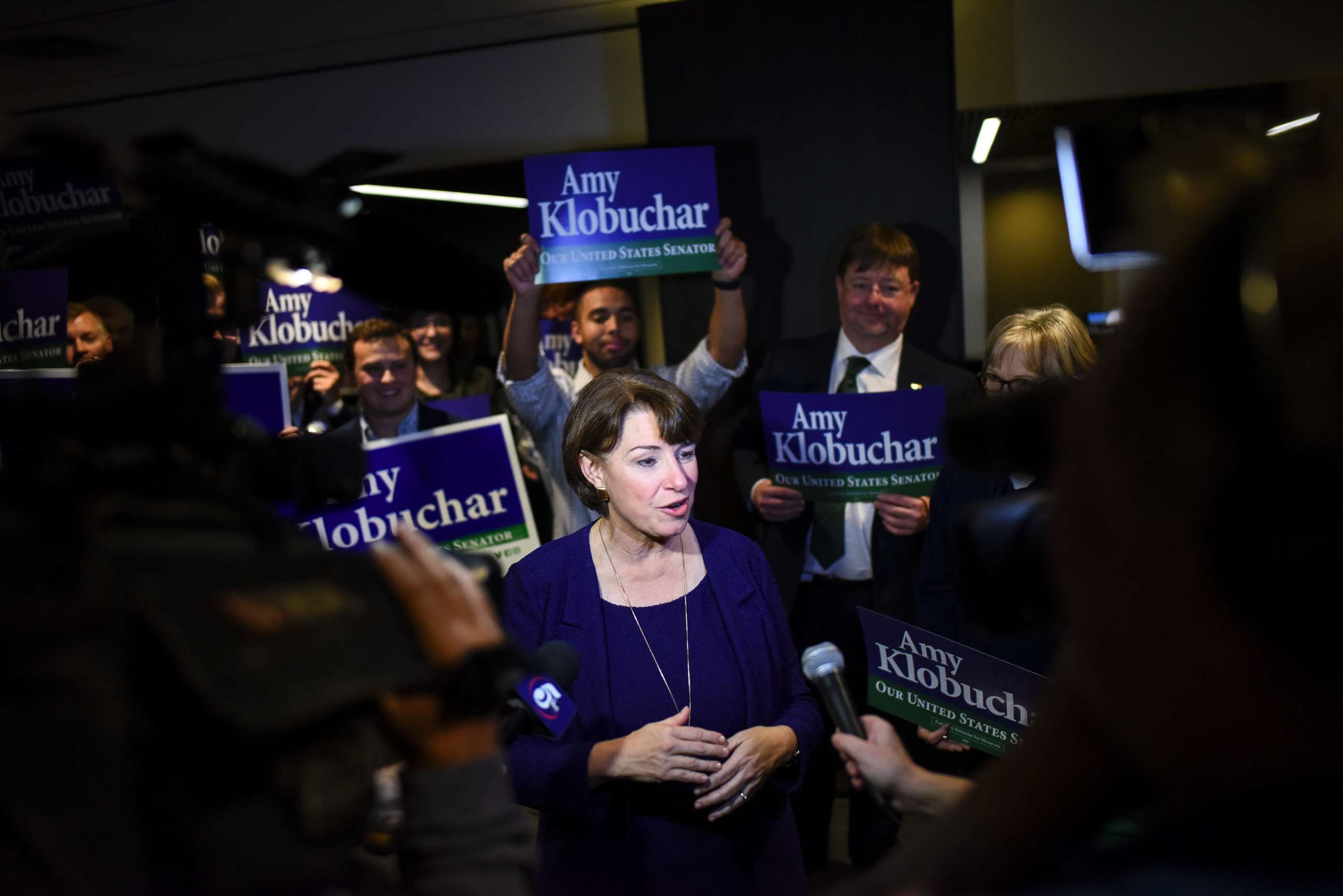 PHOTO: Sen. Amy Klobuchar speaks to the media after she arrives at the Intercontinental Hotel for DFL headquarters election night party Tuesday, Nov. 6, 2018, in St. Paul, Minn.