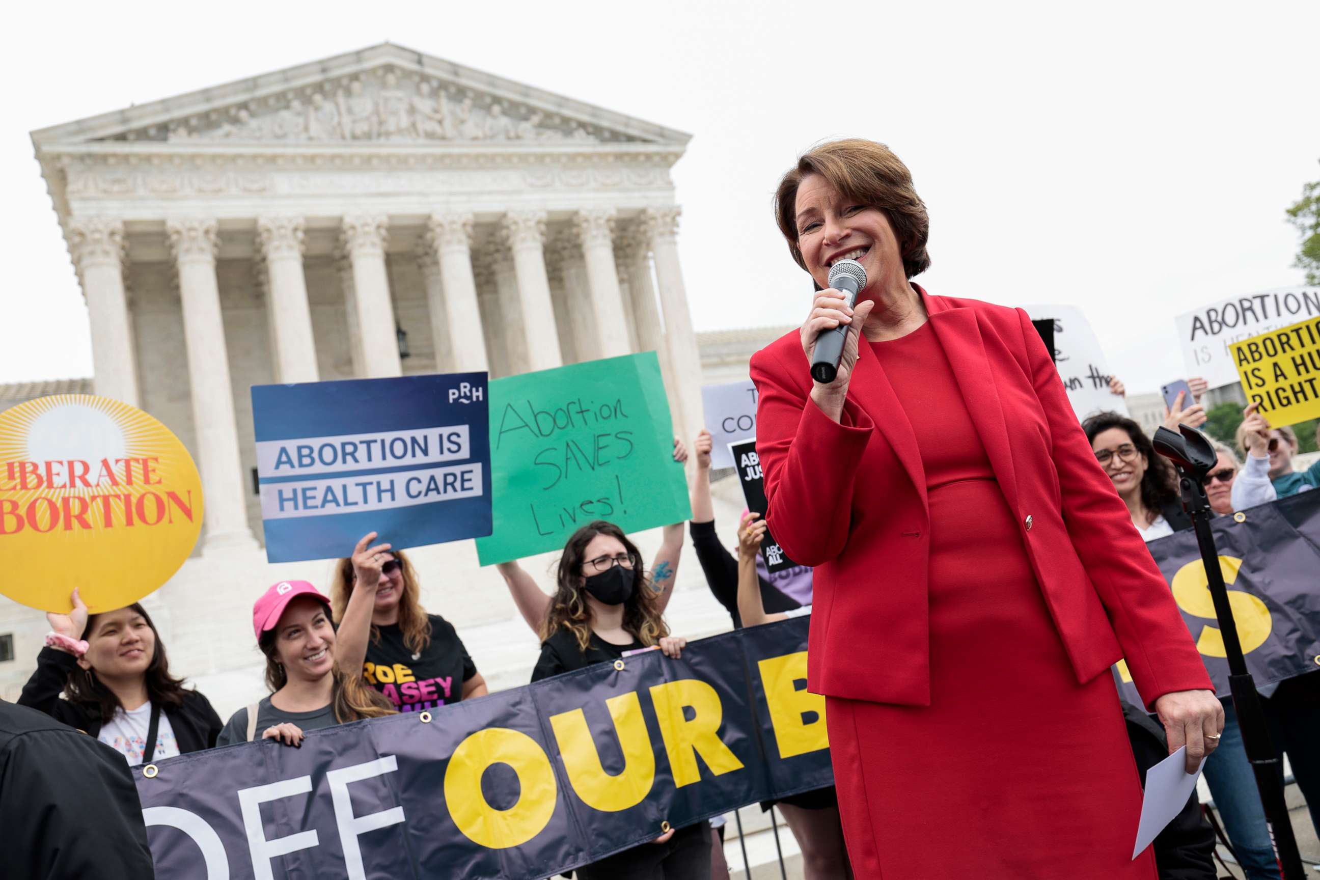 PHOTO: Sen. Amy Klobuchar speaks to pro-choice demonstrators outside of the U.S. Supreme Court Building on May 3, 2022, in Washington, D.C.