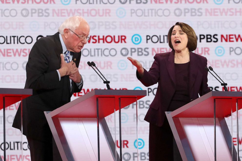 PHOTO: Democratic presidential candidate Sen. Bernie Sanders, I-Vt., reacts to Sen. Amy Klobuchar, D-Minn., during the Democratic presidential primary debate at Loyola Marymount University on Dec. 19, 2019, in Los Angeles.