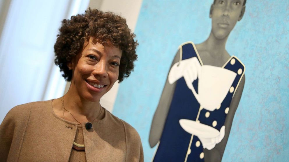 PHOTO: The Outwin Boochever Portrait Competition 2016 first prize winner, Amy Sherald, in front of her work, March 11, 2016, at the Smithsonian's National Portrait Gallery in Washington.