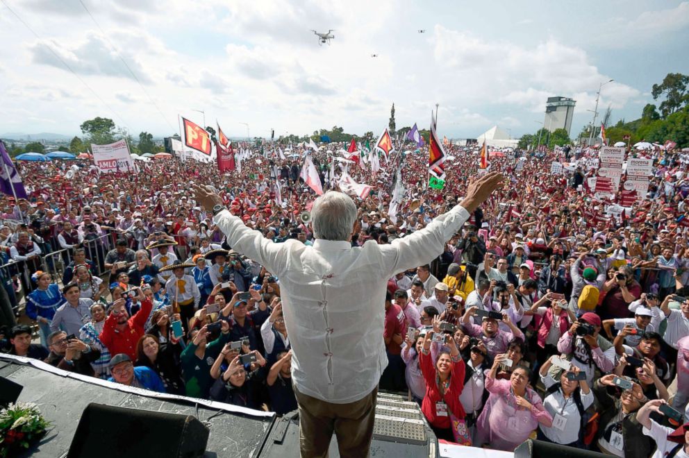 PHOTO: Mexico's presidential candidate for the MORENA party, Andres Manuel Lopez Obrador, waves to supporters during a campaign rally in Puebla, Mexico, June 23, 2018.