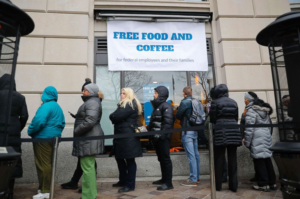 PHOTO: People wait in line at Chef Jose Andres' World Central Kitchen for free meals to workers effected by the government shutdown in Washington, Jan. 16, 2019.