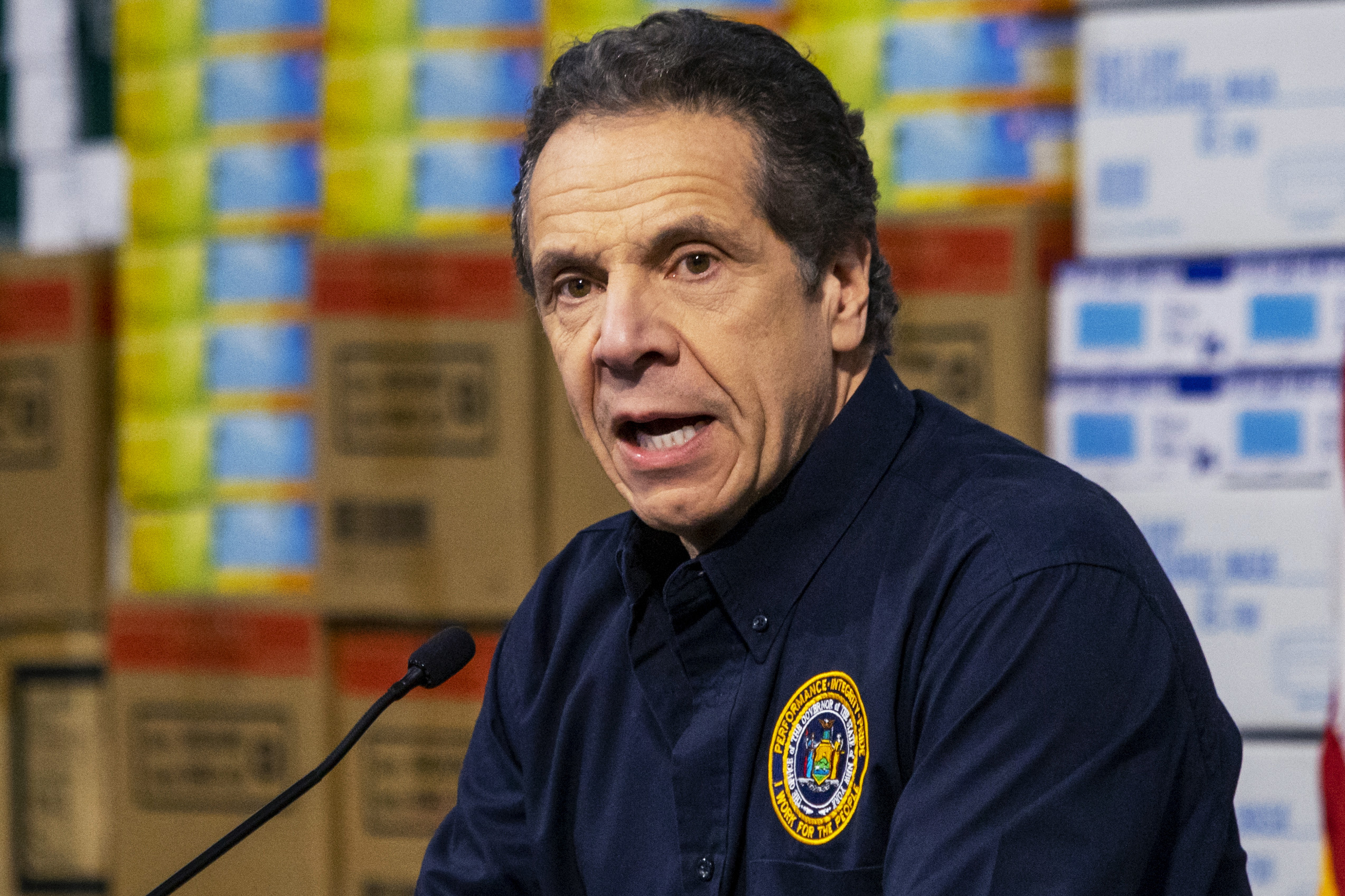 PHOTO: New York Governor Andrew Cuomo speaks to the media at the Javits Convention Center, which is being turned into a hospital to help fight coronavirus cases, March 24, 2020, in New York City.