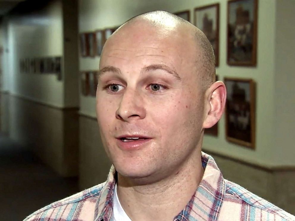 PHOTO: Officer Andrew Einstein speaks during an interview.