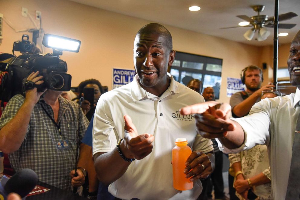 PHOTO: Democratic candidate for Florida governor, Mayor Andrew Gillum, greets lunchtime supporters at Chick N' Wings during his "Bring It Home" bus tour on Nov. 1, 2018 in Miami.