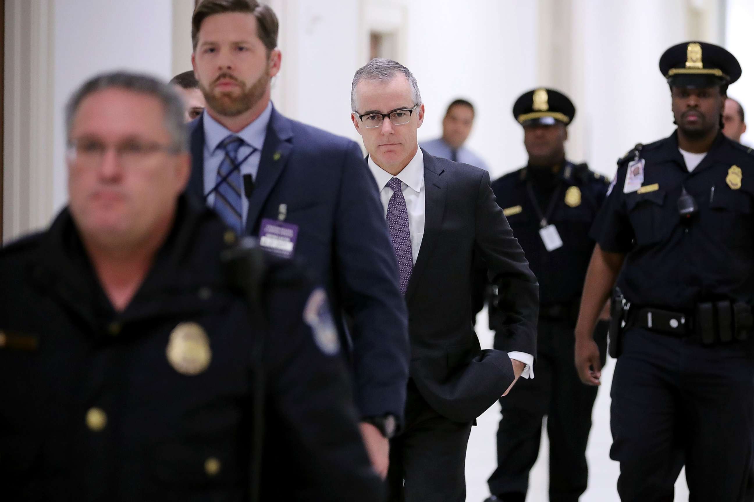 PHOTO: FBI Deputy Director Andrew McCabe is escorted by U.S. Capitol Police before a meeting with members of the Oversight and Government Reform and Judiciary committees in Washington, Dec. 21, 2017.