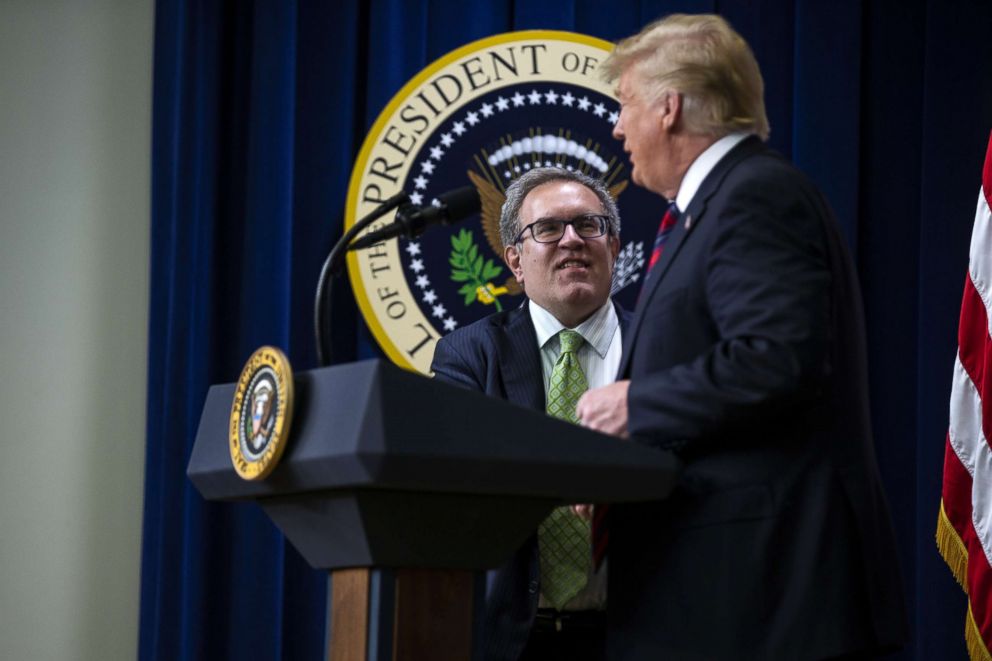 PHOTO: Andrew Wheeler, acting administrator of the Environmental Protection Agency, arrives on stage with President Donald Trump during the White House State Leadership Day conference in Washington, Oct. 23, 2018.