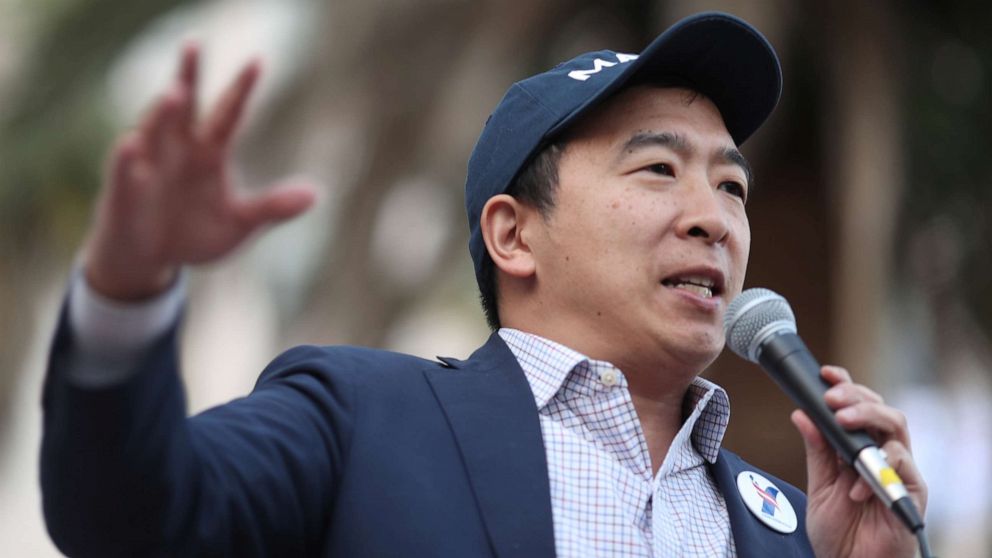 Presidential hopeful Andrew Yang targets automation at rain-drenched ...