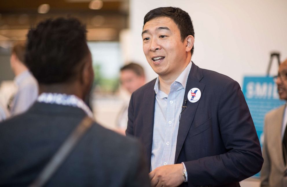 PHOTO: Democratic presidential candidate Andrew Yang talks with potential voters after a Black Caucus meeting on May 18, 2019, in Columbia, S.C.