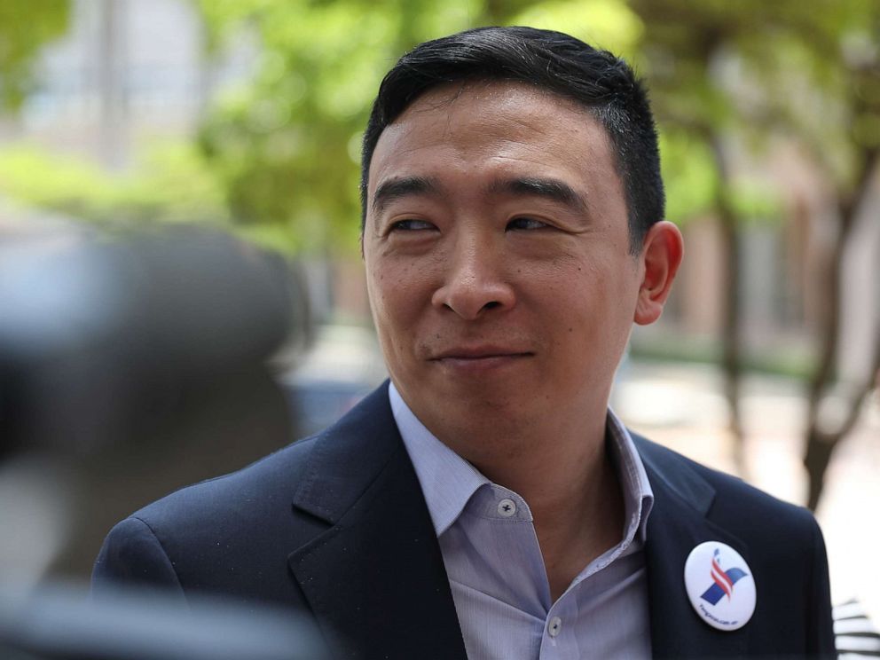 PHOTO: Democratic presidential candidate Andrew Yang speaks to media outside the Knight Concert Hall of the Adrienne Arsht Center for the Performing Arts of Miami-Dade County June 26, 2019, in Miami.