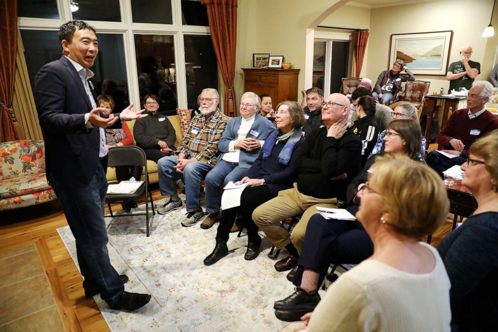 PHOTO: U.S. 2020 Democratic presidential candidate Andrew Yang speaks at Potluck Insurgency, a local democratic activist event, at the home of one of its members in Iowa City, Iowa, March 10, 2019.