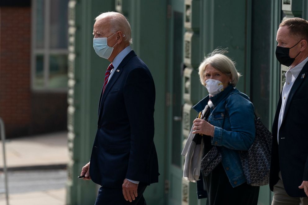 PHOTO: Democratic presidential candidate former Vice President Joe Biden and Anita Dunn center, depart The Queen theatre in Wilmington, Del., Monday, Oct. 19, 2020.