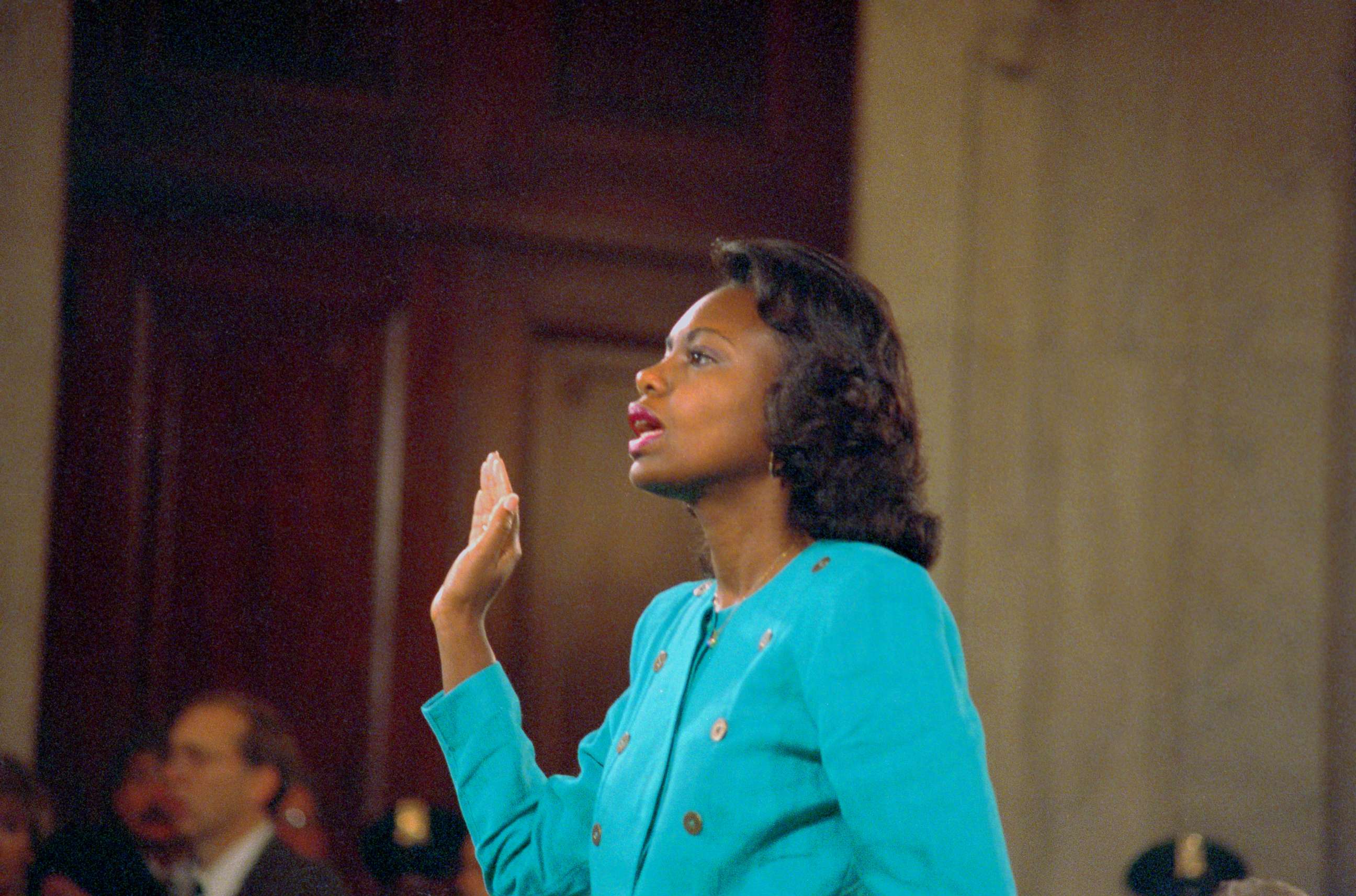 PHOTO: Anita Hill is sworn-in before testifying at the Senate Judiciary hearing on the Clarence Thomas Supreme Court nomination.