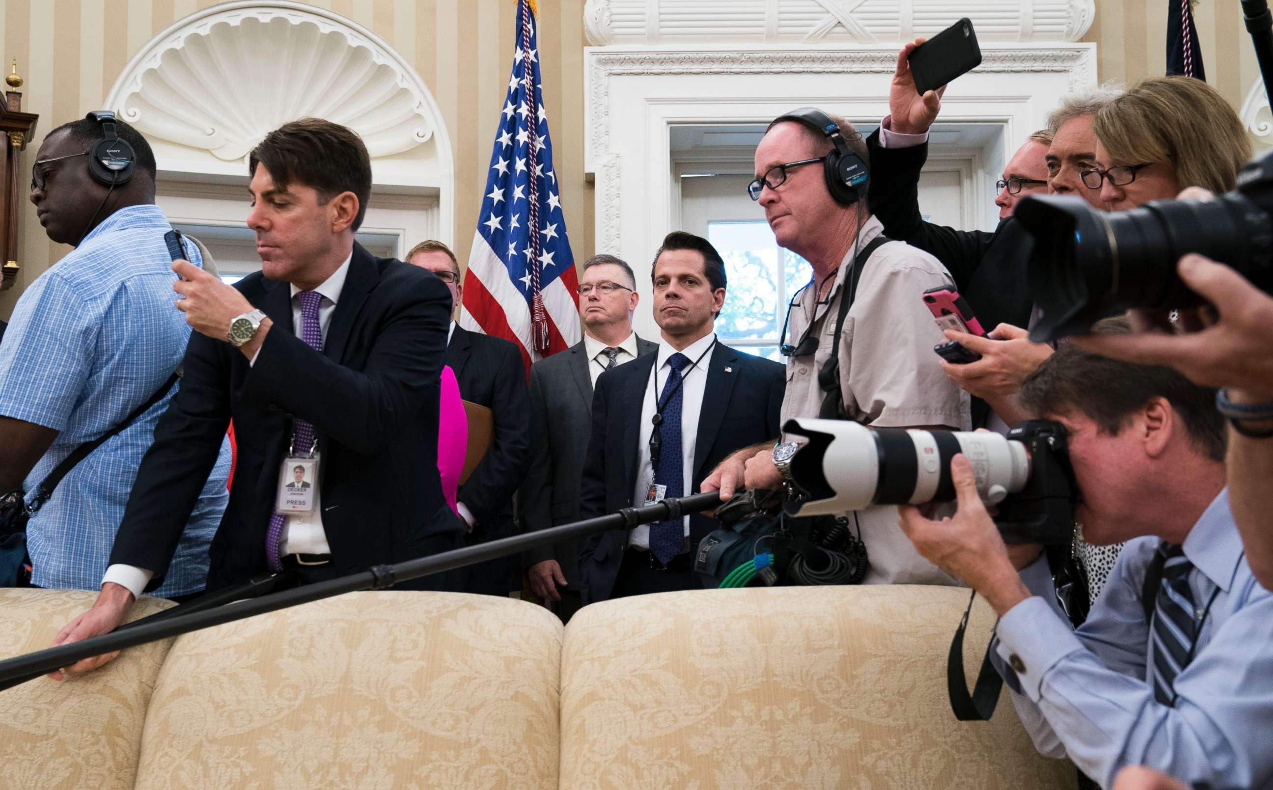 PHOTO: Outgoing White House Communications Director Anthony Scaramucci, surrounded by reporters, is pictured while President Donald Trump meets with John Kelly, his new Chief of Staff, in the Oval office of the White House, July 31, 2017.