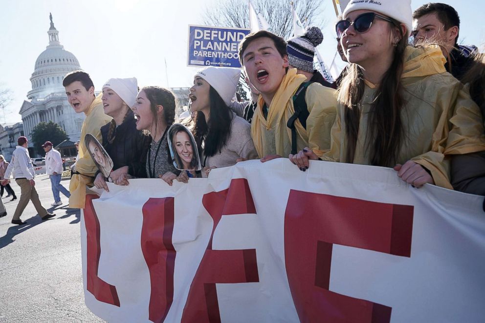 PHOTO: Anti-abortion rights activists pass the Capitol building during the 2018 March for Life, Jan. 19, 2018 in Washington, D.C.