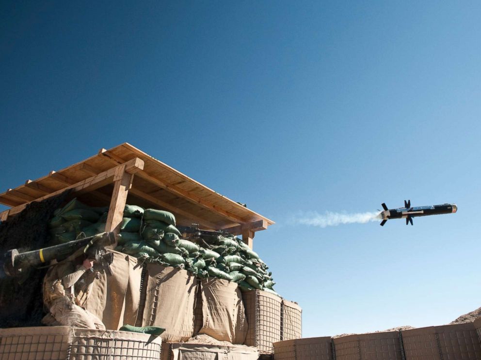 PHOTO: A US Marine from 1st Battalion, 8th Marines, Bravo company launches an FMG-148 Javelin anti-tank missile at Mirage patrol base, Musa Qala District, Helmand province on February 8, 2011.