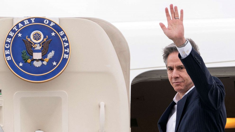 PHOTO: U.S. Secretary of State Antony Blinken waves as he boards a plane, en route to Israel, at the Warsaw Chopin Airport, in Warsaw, Poland, March 26, 2022.