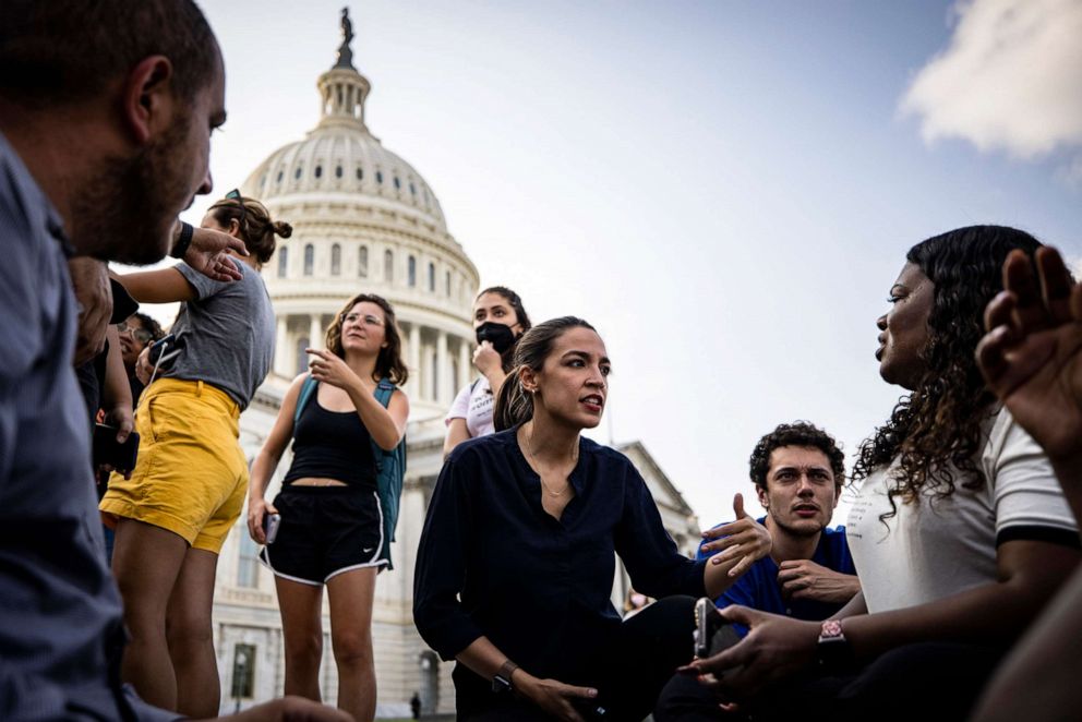 PHOTO: Representatives Alexandria Ocasio-Cortez, center, and Cori Bush, right, protest for an extension of the eviction moratorium on the steps to the House of Representatives at the U.S. Capitol Building, Aug. 1, 2021, in Washington, D.C. 