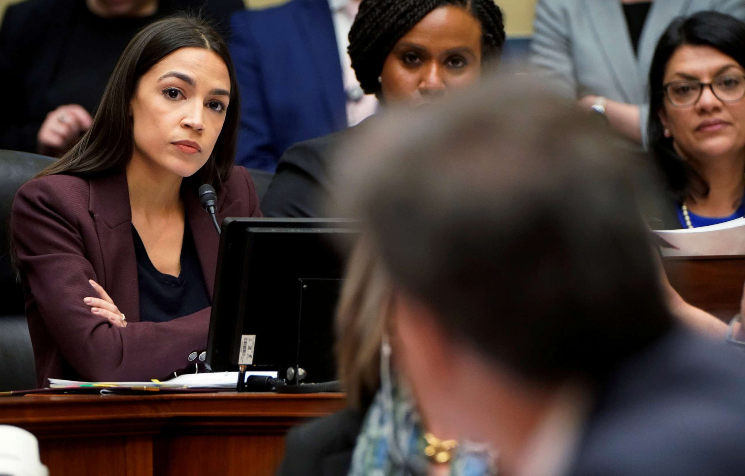 PHOTO: Rep. Alexandria Ocasio-Cortez, Rep. Ayanna Pressley and Rep. Rashida Tlaib listen to former Trump personal attorney Michael Cohen during his testimony at a House Committee on Oversight and Reform hearing on Capitol Hill, Feb. 27, 2019.