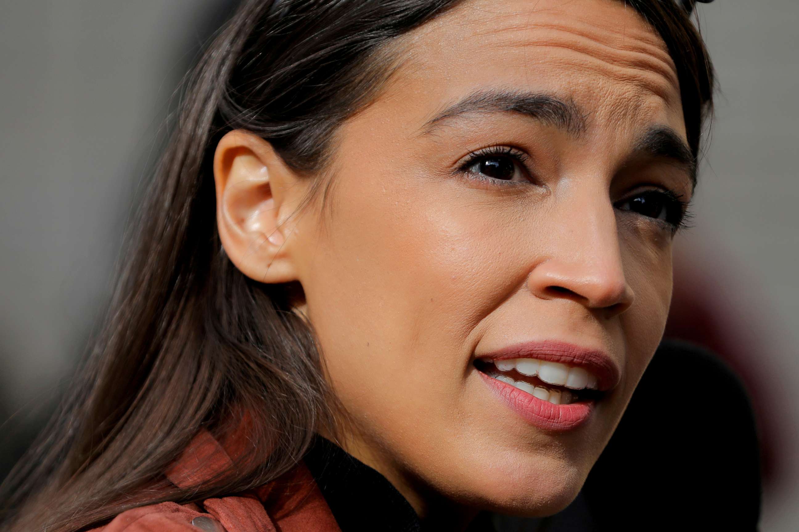 PHOTO: U.S. Rep. Alexandria Ocasio-Cortez, D-N.Y., addresses media as she arrives to vote early at a polling station in New York City on Oct. 25, 2020.