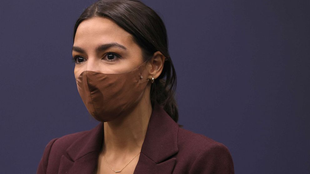 PHOTO: Rep. Alexandria Ocasio-Cortez listens during a news conference to introduce the "Puerto Rico Self-Determination Act of 2021" at Rayburn House Office Building on Capitol Hill, March 18, 2021.