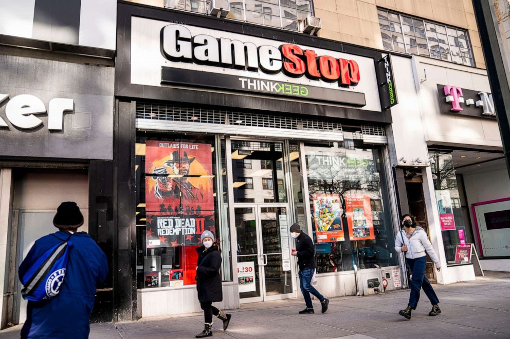 PHOTO: Pedestrians pass a GameStop store on 14th Street at Union Square, New York, Jan. 28, 2021.