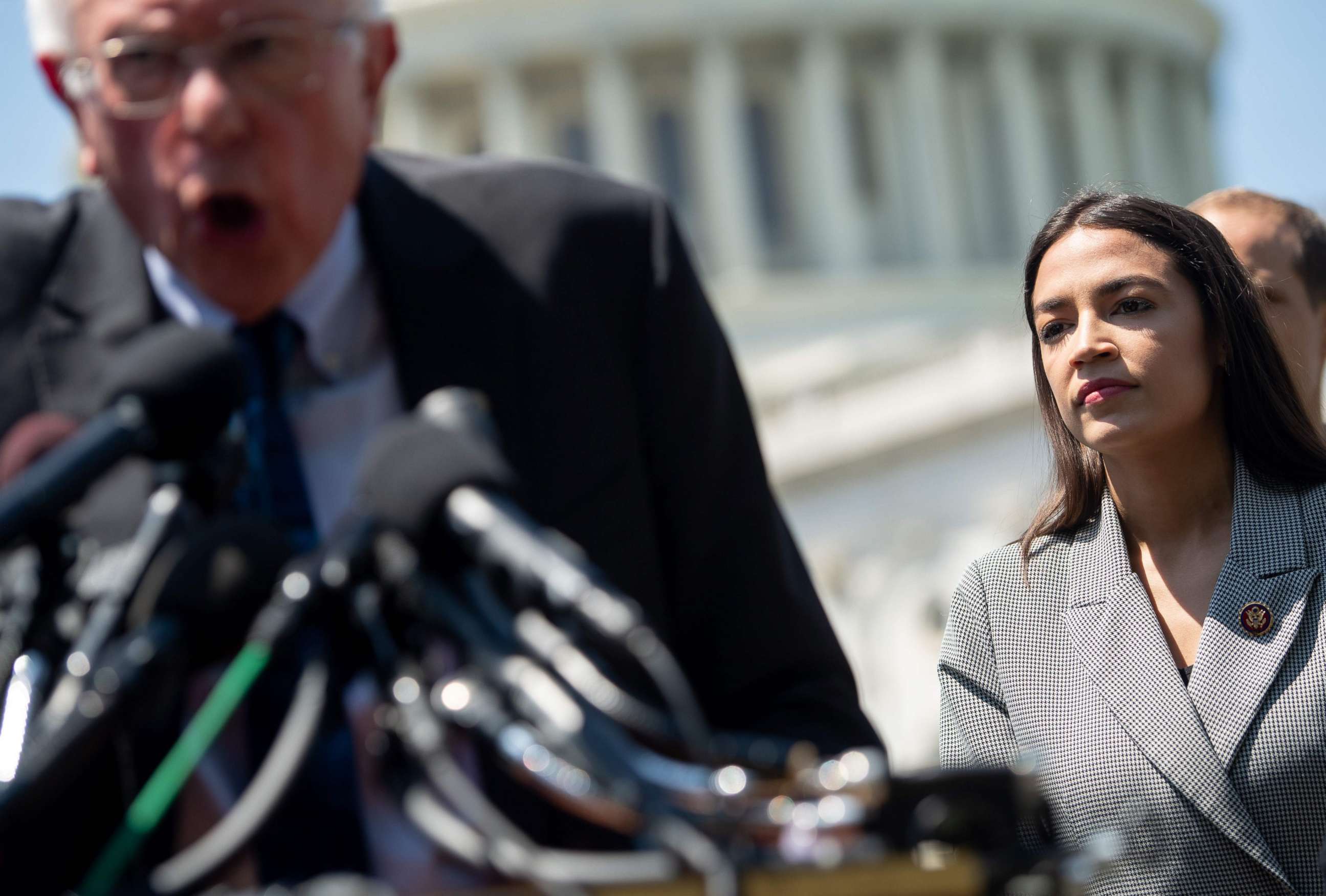 PHOTO: In this file photo taken on June 24, 2019. Sen. Bernie Sanders, I-Vt., speaks alongside Representative Alexandria Ocasio-Cortez, D-N.Y., during a press conference to introduce college affordability legislation outside the U.S. Capitol.