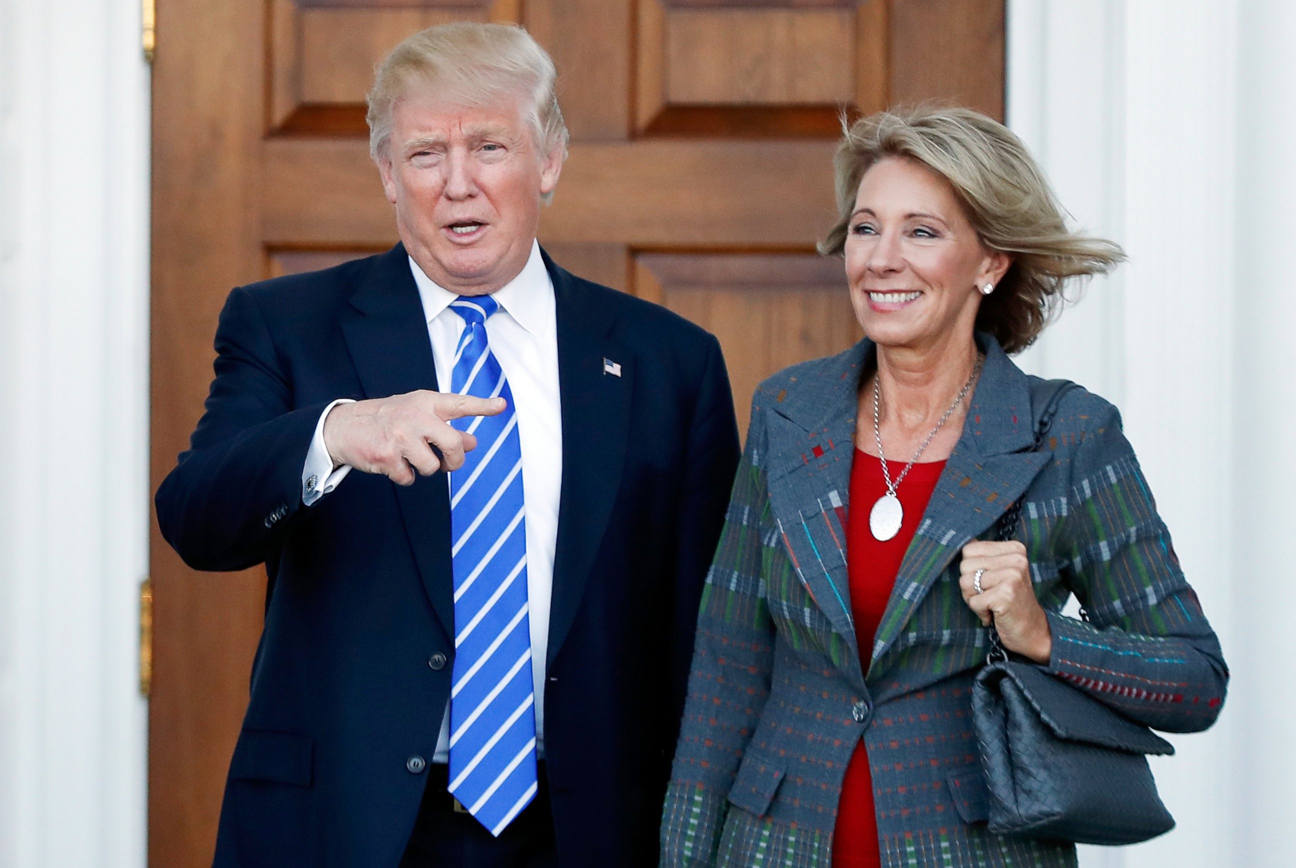 PHOTO: In this Nov. 19, 2016 file photo, President-elect Donald Trump stands with Education Secretary-designate Betsy DeVos in Bedminster, N.J., Nov. 19, 2016.