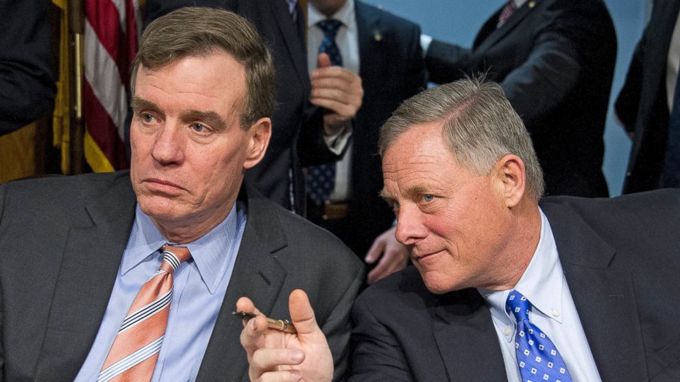 Senators Mark Warner (D-Va.), left, and Richard Burr (R-N.C.), right, at the confirmation hearing on the nomination of Representative Mike Pompeo (R-Kan.) to be Director of the Central Intelligence Agency (CIA) on Capitol Hill, Jan. 12, 2017.