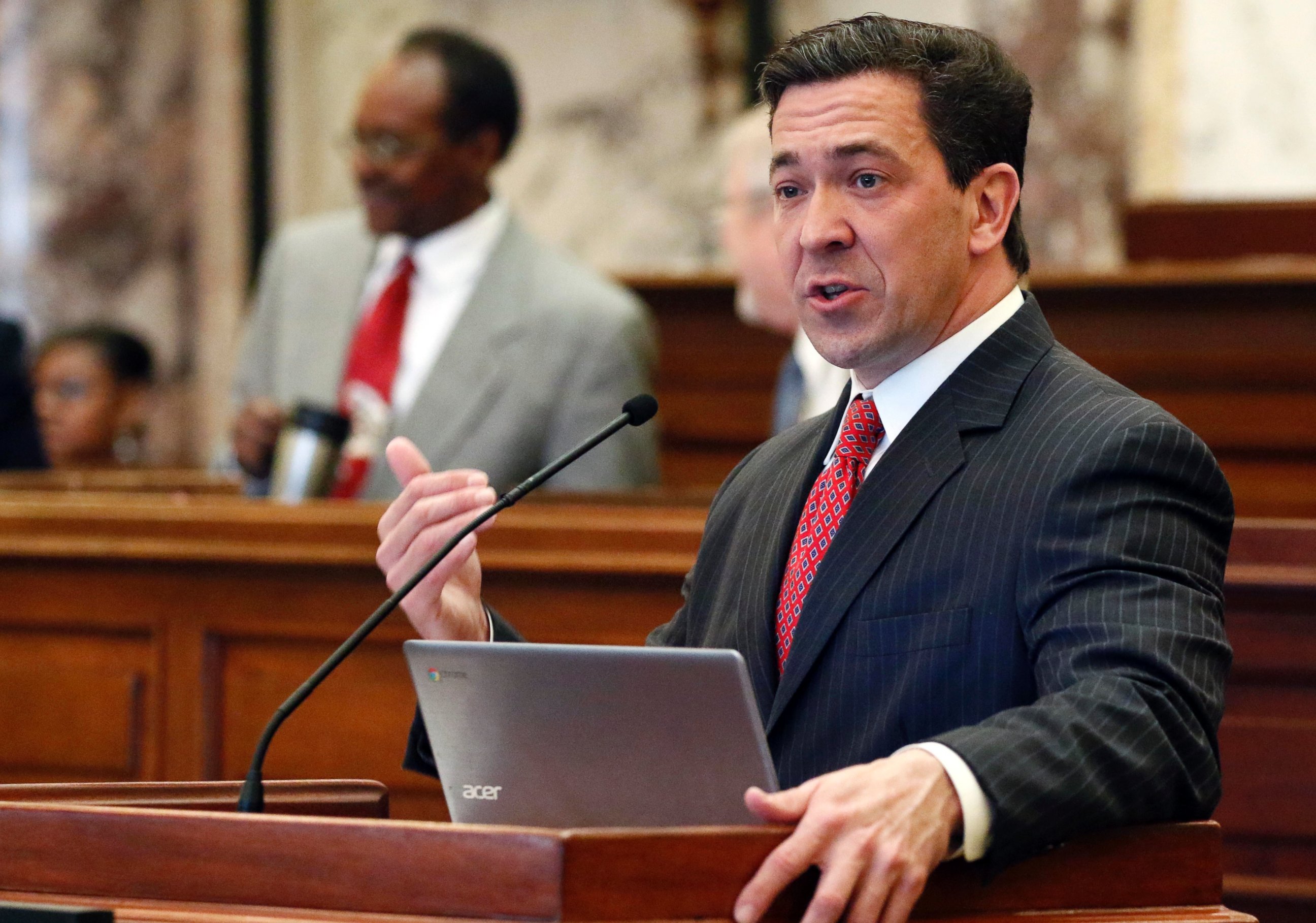 In this Tuesday, March 7, 2017, file photo, state Sen. Chris McDaniel, R-Ellisville, speaks during a floor debate in Jackson, Miss. McDaniel is hinting strongly that he will challenge U.S. Sen. Roger Wicker in the 2018 U.S. Senate race.