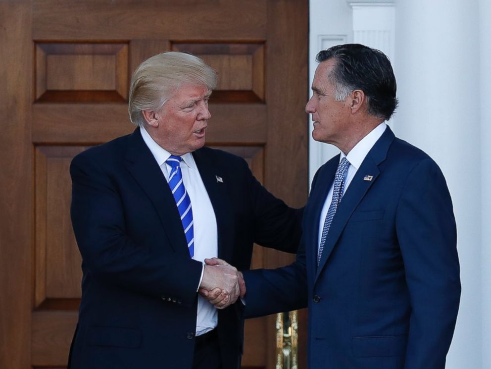 PHOTO: President-elect Donald Trump and Mitt Romney shake hands as Romney leaves Trump National Golf Club Bedminster in Bedminster, N.J., Nov. 19, 2016.