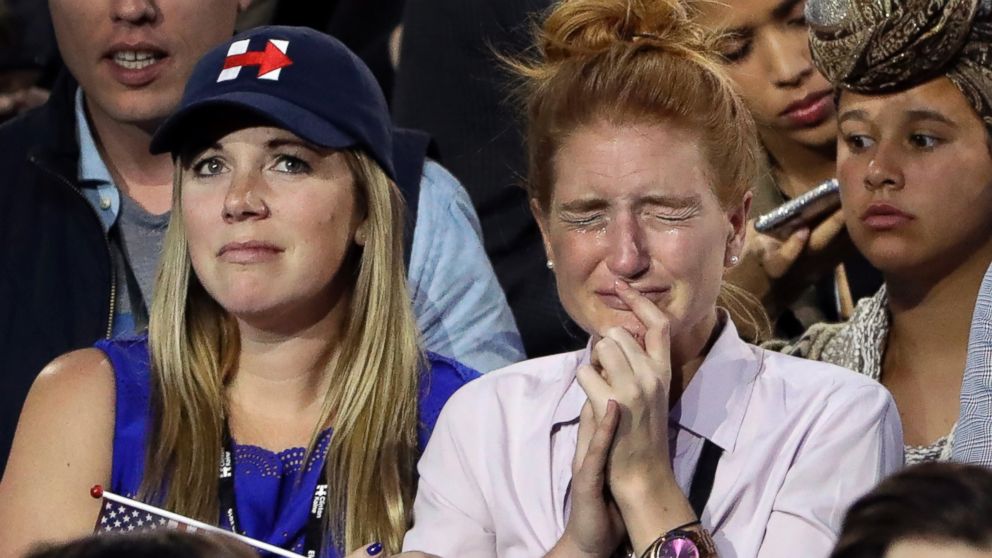 Supporters watch the election results during Hillary Clinton's election night rally in the Jacob Javits Center glass enclosed lobby in New York, Nov. 8, 2016.