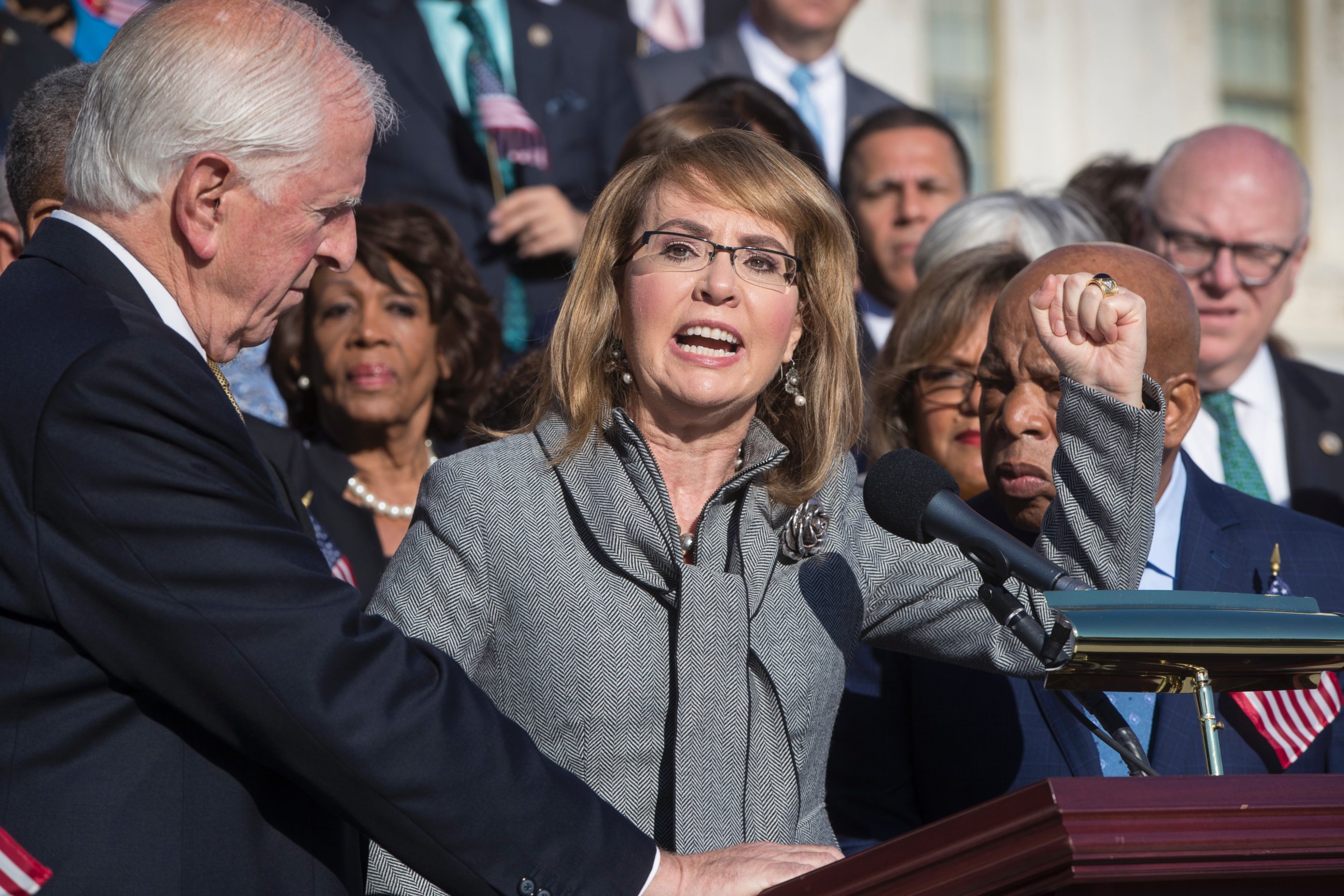 Former Rep. Gabby Giffords of Arizona who survived an assassination attempt in 2011, joins Democrats in a call for action on gun safety Wednesday morning after the deadly mass shooting in Las Vegas, at the Capitol in Washington, Wednesday, Oct. 4, 2017.