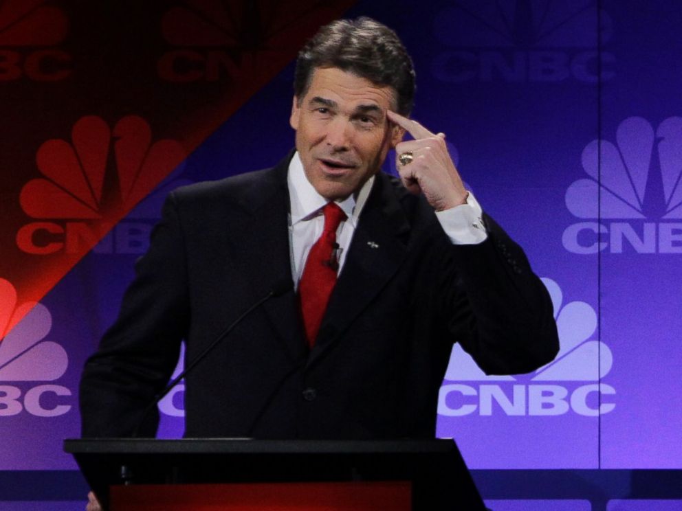 PHOTO: Republican presidential candidate Texas Gov. Rick Perry points his head as he speaks during a Republican Presidential Debate at Oakland University in Auburn Hills, Mich., Nov. 9, 2011.