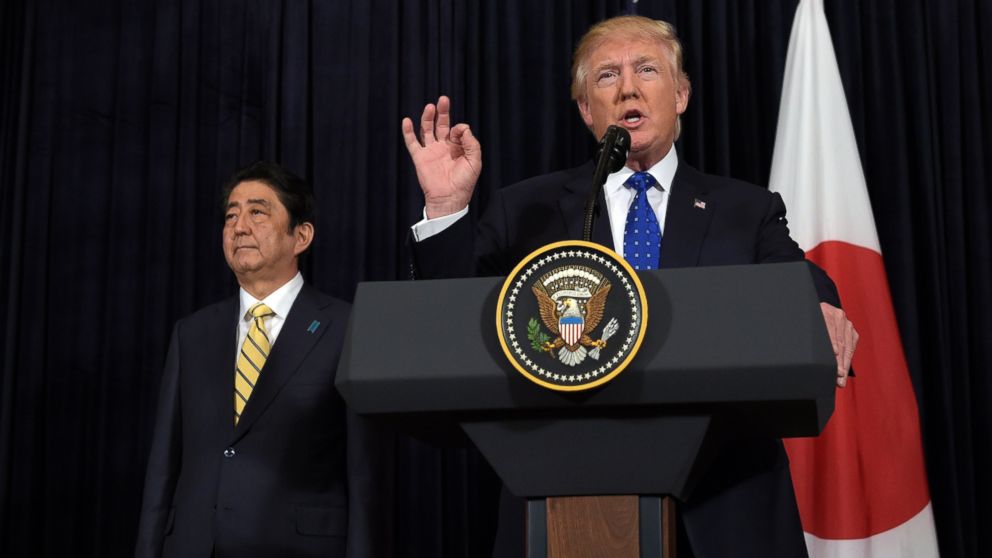 PHOTO: President Donald Trump speaks as Japanese Prime Minister Shinzo Abe listens during statements about North Korea at Mar-a-Lago in Palm Beach, Florida, Feb. 11, 2017. 