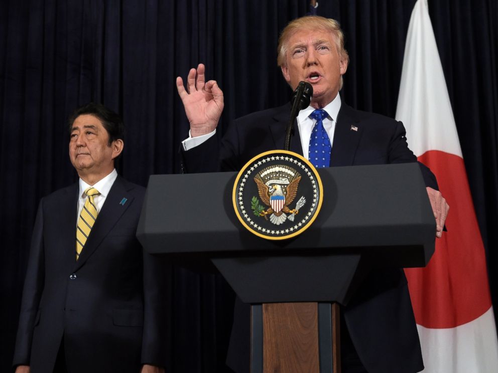 PHOTO: President Donald Trump speaks as Japanese Prime Minister Shinzo Abe listens during statements about North Korea at Mar-a-Lago in Palm Beach, Florida, Feb. 11, 2017. 