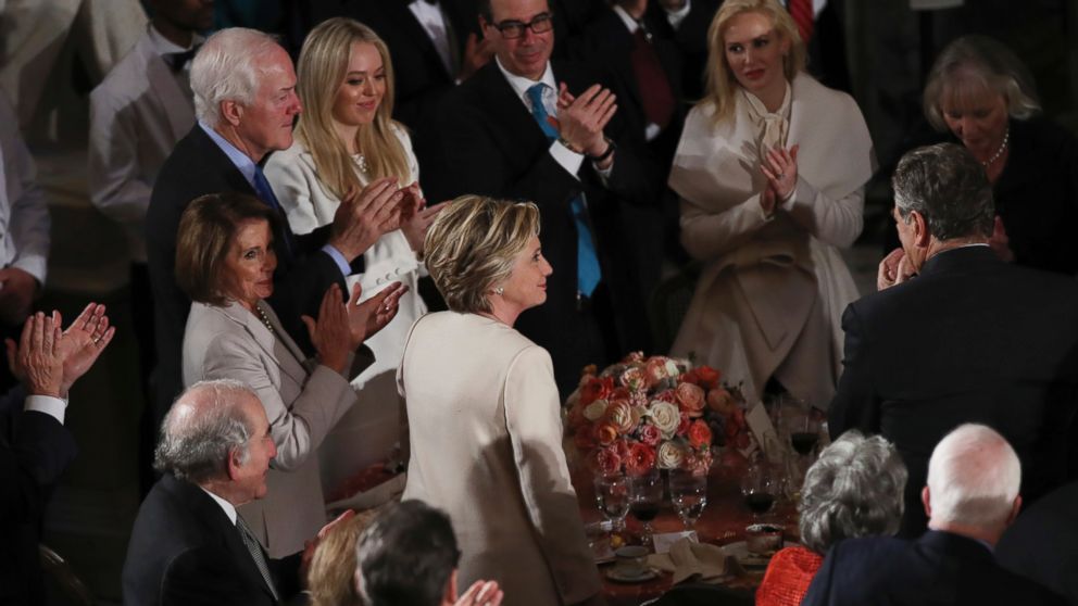 PHOTO: Hillary Clinton stands as she is recognized by President Donald Trump during his speech at the inaugural luncheon at the Statuary Hall in the Capitol, Jan. 20, 2017, in Washington.