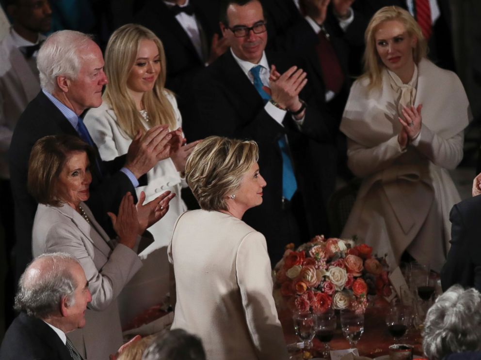 PHOTO: Hillary Clinton stands as she is recognized by President Donald Trump during his speech at the inaugural luncheon at the Statuary Hall in the Capitol, Jan. 20, 2017, in Washington.